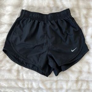 Black Nike running shorts